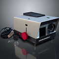 Desktoport Electronic Device With Red Knob Black Vents Lens Power Cable And Plug