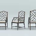 Three Bamboo Leisure Chairs With Crisscross Lattice Backrest Armrests And Light Colored Cushions