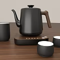 Sleek Black Tea Set with Wooden Handle Teapot and White Inner Teacups on Tabletop