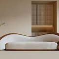 Elegant Modern Sectional Sofa In White And Brown With Indoor Plants And Floor Lamp