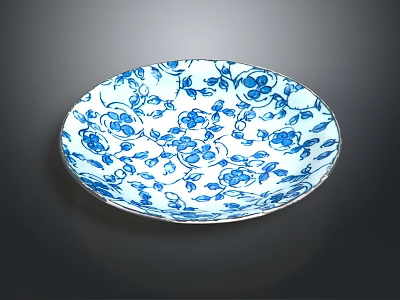 Blue and White Porcelain Plate With Floral Patterns and Leaf Designs 3d model