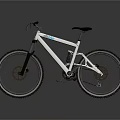 White Frame Mountain Bike With Black Seat Handlebars And Wide Tires For Riding