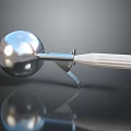 Durable Metal Ice Cream Scoop with Silver Ball and White Handle for Homemade Desserts