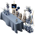 Elegant Table and Chair Set with Blue Tablecloth Decorative Flowers and Balloons