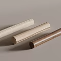 Three Natural Cylindrical Wood And Stone Sticks In Light And Dark Tones