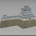 Traditional Japanese Castle Architecture With Multi Tiered Tower Stone Wall And Blue Roof