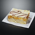 Delicious Square Layered Cake with Vanilla Cream and Chocolate Drizzle on White Paper