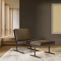 Modern Leather Accent Chair With Ottoman On Wooden Floor And Area Rug Interior