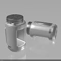 Two Sleek Silver Metal Containers With Modern Design Lid And Textured Surface