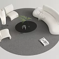 White Curved Sofa And Black Round Coffee Table With Green Plant Chairs Gray Rug Magazine