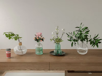 Different Shaped Glass Vases With Pink Flowers White Blooms And Greenery On Wooden Table 3d model