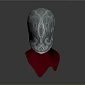 Detailed Silver Decorative Helmet Featuring Ornate Patterns And Red Ribbon