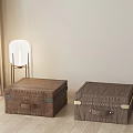 Two Decorative Storage Trunks with Wooden Finish and Metal Accents in Modern Indoor Space