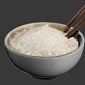 White Bowl Filled With Cooked Rice And Wooden Chopsticks Inside