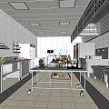 Modern Commercial Kitchen Interior With Stainless Steel Worktables Range Hood And White Tiled Walls