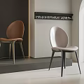 Stylish Modern Leisure Chairs with Brown Beige Upholstery Curved Backs and Minimalist Interior Design