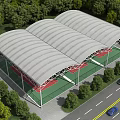 Modern School Building with Curved Roof and Sports Court Surrounded by Green Trees Near Road