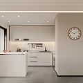 Modern Minimalist Kitchen Interior With White Cabinets Island Counter Coffee Machine And Wall Clock