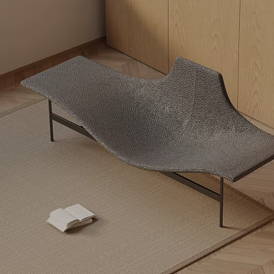 Gray Textured Leisure Chair with Black Metal Legs Book Beside Wooden Floor Rug 3d model