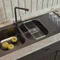 Black Double Bowl Kitchen Sink With Green Apples Drying Rack Faucet And Marble Countertop