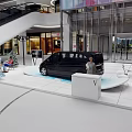 Modern Liquor Store In Shopping Mall With Wine Displays And Seating Area