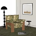 Single Sofa With Floral Patterned Fabric Wooden Frame Floor Lamp And Side Table In Room