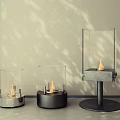 Stylish Glass Enclosed Fireplaces with Different Base Designs and Burning Flames for Modern Home Decor