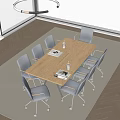 Modern Light Wooden Conference Table with Six Gray Chairs Coffee Cups and Documents