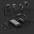 Electronic Power Adapters And Chargers With Various Plugs And Cords