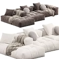 Velvet Upholstered Multi-seat Sectional Sofa in Neutral Tones with Plush Cushions and Throw Blankets