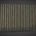 Corrugated Metal Fence with Rustic Green Brown Tones and Metal Support Brackets