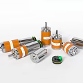 Various Types Of Industrial Motors With Orange Silver Casings And Cylindrical Design