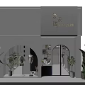 Modern White Clothing Store With Arched Doorway Glass Doors And Green Plants