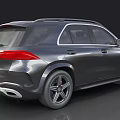 Gray Mercedes SUV With Modern Streamlined Body Front Grille And Large Alloy Wheels