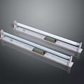 White Long Tube Light Fixtures With Metal Brackets On Gray Background