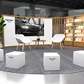 Modern Lounge Area With White Chairs Round Coffee Table Green Plants Decorative Painting And Bookshelves