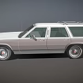 Vintage White Station Wagon With Roof Rack And Classic Silver Body Design
