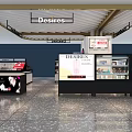 Modern Retail Display Shelves With Desires Brand Products And Glass Showcases In Store