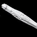 White Carved Decorative Columns With Intricate Floral Patterns And Ornate Details