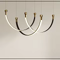 Modern Curved Pendant Chandelier With Brass Accents And Black Metal Frames Hanging In Interior