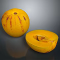 Fresh Yellow Fruit with Red Stripes Halved Showing Juicy Yellow Flesh and Small Seeds