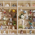 Stuffed Animal Dolls Neatly Arranged On Wooden Grid Shelf With Varied Styles