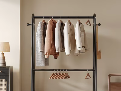 Modern Interior Floor Standing Clothes Rack With Hanging Sweaters And Small Hangers 3d model