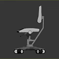 Modern Office Chair With Silver Metal Backrest Black Seat And Wheeled Base Design