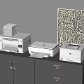 White Modern Office Appliances Placed On Gray Cabinet With Abstract Artwork