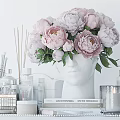 Stylish Modern Bathroom Accessories With Scented Sticks Skincare Bottles And Pink Peonies