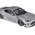 White Modified Sports Car With Rear Spoiler Body Kit And Sporty Wheels