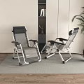 Folding Lounge Chairs with Black Mesh and Silver Metal Frame in Indoor Living Room