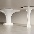 Two Modern White Sculptural Pedestals In Minimalist Interior With Light Floor