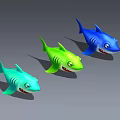 Three Colorful Cartoon Style Toy Shark Figures With Big Eyes And Smiling Mouth